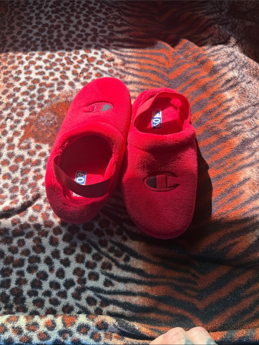 Champion women’s size 9 Red Plush Slip-Ons with Embroidered Logo